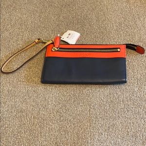 Coach navy and red leather zippy wristlet